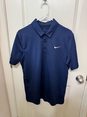 Nike Men's Dri-FIT Polo Shirt in Navy with White Swoosh